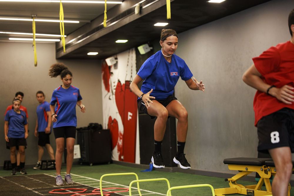 SAS students in an indoor plyometrics session